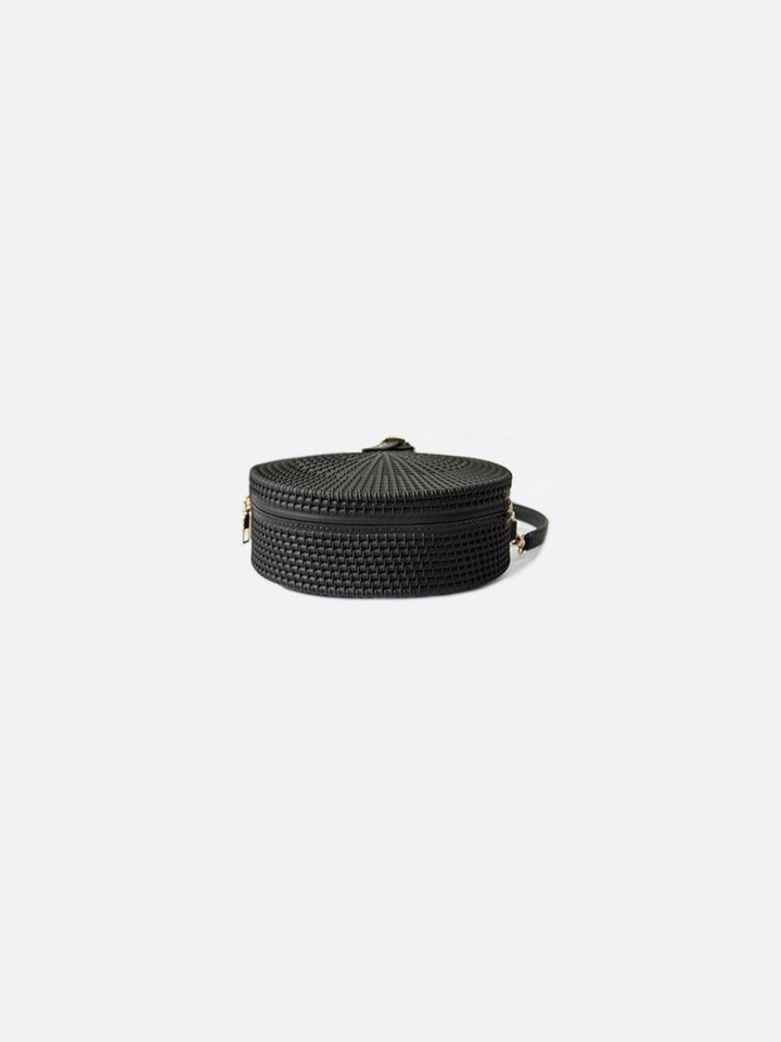 Round leather handbag<br>Amira