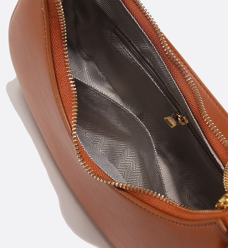 Half-moon leather shoulder bag<br>Oraya
